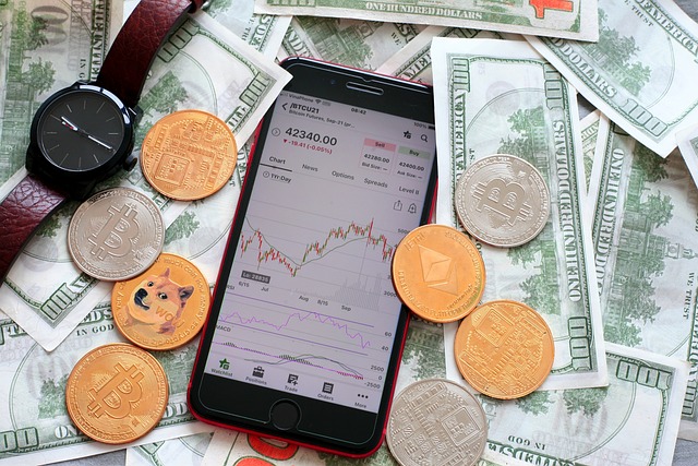 An image displaying trading charts on the phone, watch, crypto, and dollars